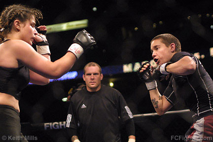 IFC Global Domination (Sep 2003): Amanda Buckner (right) vs. Ginelle Marquez - Photo by Keith Mills