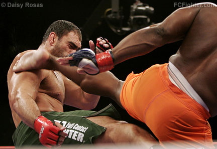 IFL (Jan 19, 2007): Curtis Crawford lands a kick on Antoine Jaoude - Photo by Daisy Rosas