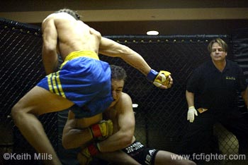 Alberto Crane nailing the takedown on John Mahlow early in the second 