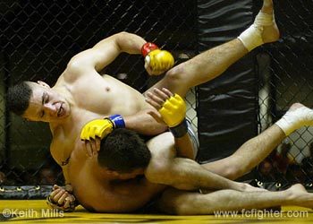 Diego Sanchez punishing Ray Elbe with knees and punches