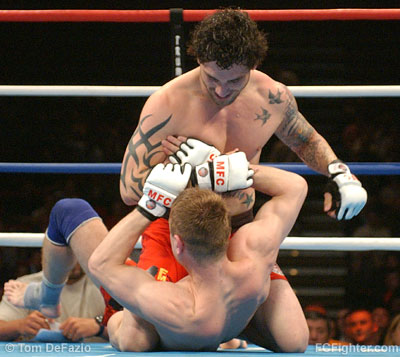 MFC 4: Kurt Pellegrino grins as he beats on Sergei Goliaev - Photo by Tom DeFazio