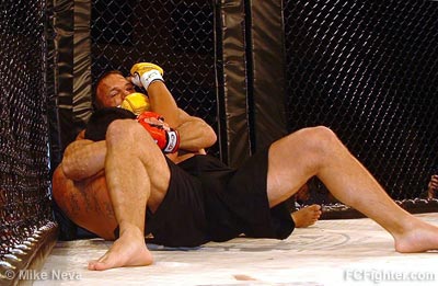 Manabusen (bottom) taps to choke by Routh - Photo by Mike Neva