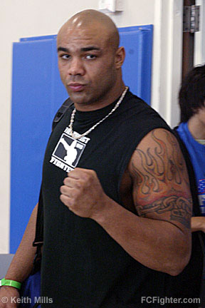 Mike Kyle entering with a stylish t-shirt