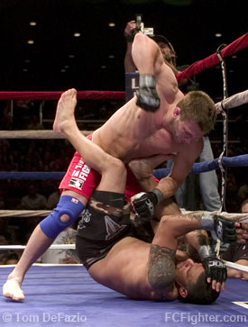 Ring of Combat 19: Dom Stanco rains down punches on Marc Berracol - Photo by Tom DeFazio