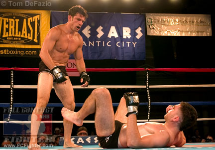 Ring of Combat 4: David Tirelli standing over Luke Cummo - Photo by Tom DeFazio