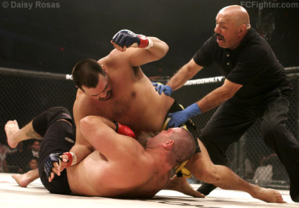 Strikeforce 3: Paul Buentello being pulled off of a KO'd David 'Tank' Abbott - Photo by Daisy Rosas