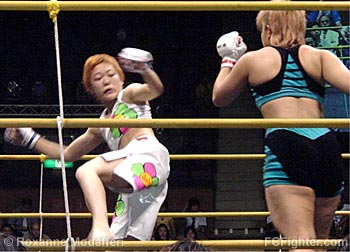 Tama-chan (left) vs. Kumiko Maekawa