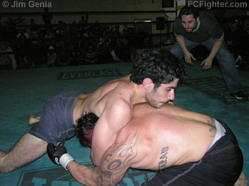 Underground Combat League (Nov. 5, 2006): Mike Milian (left) sprawls on Craig Parker - Photo by Jim Genia