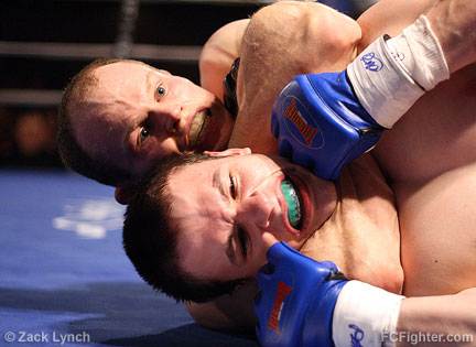 Untamed 9: Matt Fletcher sinks in a rear-naked choke on Chris Reedy to end their fight - Photo by Zack Lynch