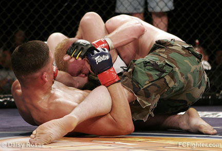 Nathan Diaz taps out Joe Hurley with a triangle choke