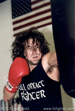 John working the heavy bag