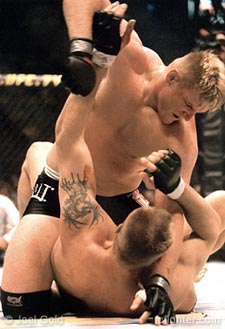 Josh Barnet mounted and pounding on Semmy Schilt at UFC 32
