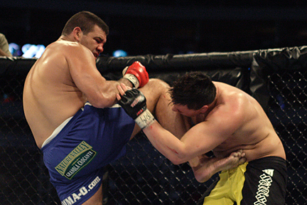 Art of War (Mar 9, 2007): Pedro Rizzo blasting Justin Eilers - Photo by Keith Mills