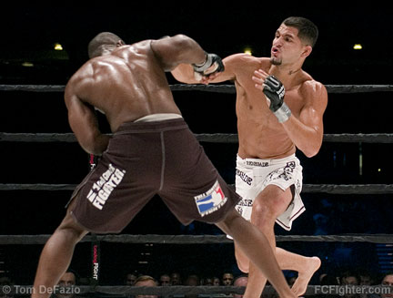 BodogFight (July 14, 2007): Jorge Masvidal (right) trading with Yves Edwards - Photo by Tom DeFazio