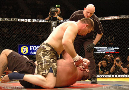 Cage Rage 21: Gary Turner (top) finishing David "Tank" Abbott with strikes from the mount - Photo by David West