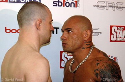 Cage Rage 21 Weigh-ins: Evangelista "Cyborg" Santos (right)  eyeballs James Zikic - Photo by David West