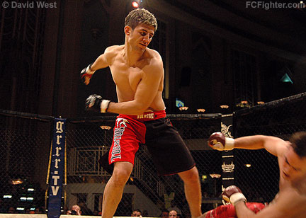 Cage Rage Contenders 8 (Feb 2, 2008): Sami Berik (standing) sends Mark Smith down and out - Photo by David West