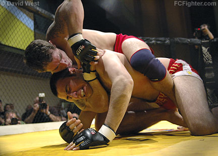 Cage Rage Contenders 8 (Feb 2, 2008): Tony Pasos (top) going for the choke on Mamarizaev Jahongir - Photo by David West