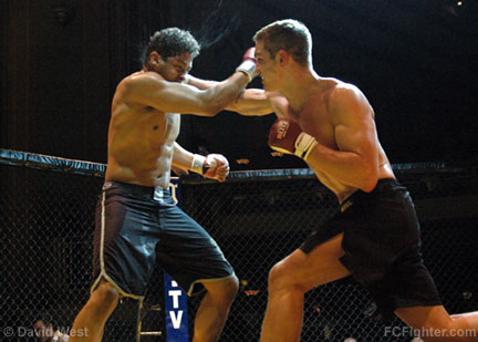 Cage Rage Contenders 5: John Hathaway (right) cracks Tarcio Santana - Photo by David West