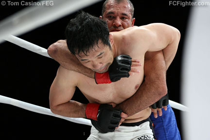 K-1 Dynamite!! USA (June 2, 2007): Kazushi Sakuraba works for a Kimura on Royce Gracie - Photo courtesy of Tom Casino/FEG