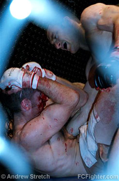 Extreme Cage Combat 5: Cory MacDonald (top) vs. Rowan Cunningham - Photo by Andrew Stretch