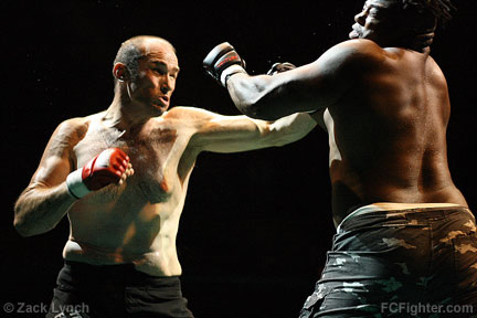 EFI (June 16, 2007): Randy Smith lands a solid punch to the chin of Alonzo Hardnett - Photo by Zack Lynch