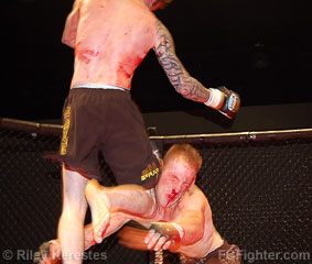 Explosion 2 (March 10, 2007): Jordan Harris knees Matt Kucala - Photo by Riley Kerestes