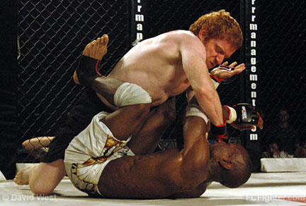 FX3 Fight Night 5: Paul Reed (top) pounds on Wesley Felix - Photo by David West