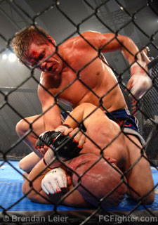 Hardcore Championship Fighting (July 21, 2007): Jesse Bongfeldt pounding on Sean Pierson - Photo by Brendan Leier