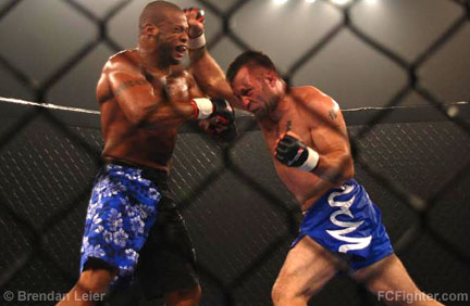 Hardcore Championship Fighting (July 21, 2007): Solomon Hutcherson (left) exchanging with Nabil Khatib - Photo by Brendan Leier
