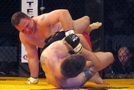 King of the Cage Canada (July 14, 2007): John Cole attempting a leg lock on Pete Rogers - Photo by Lance Parsons