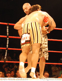 Maximum Fighting Championship 12: Scott Junk kneeing Jimmy Ambriz - Photo by Dr. Mark Jackson