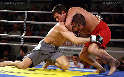 Untamed X: Matt Smith tries hold off Chris Snow with a choke - Photo by Zack Lynch