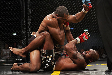 Ultimate Warrior Challenge (June 30, 2007): Chris Baten (top) pounding on Herbert Goodman - Photo by Keith Mills