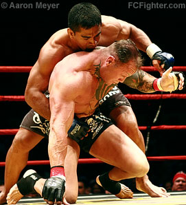 X-1 Xtreme Fighting 2: Falaniko Vitale gets Mavrick Harvey's back - Photo by Aaron Meyer
