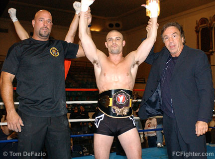 L-R: Referee Dan Miragliotta, Marlon Sims, promoter Louis Neglia