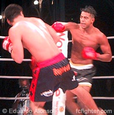 Emerson Nunes (left) dodges a punch thrown by Fabio Pelezinho