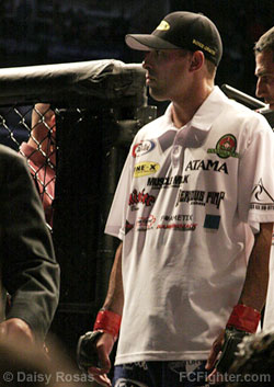 Royce Gracie leaves the cage after losing to Matt Hughes