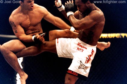 Pete Spratt kicking an airborn Robbie Lawler at UFC 42