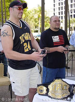 Tim Sylvia (left) playing UFC video game against Cabbage Correira