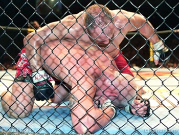 Randy Couture pounding on Tito Ortiz at UFC 44
