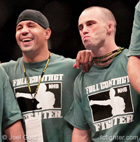 Jens Pulver (right) at UFC 49 standing next to Tony Fryklund after training partner Justin Eilers KO'd Mike Kyle